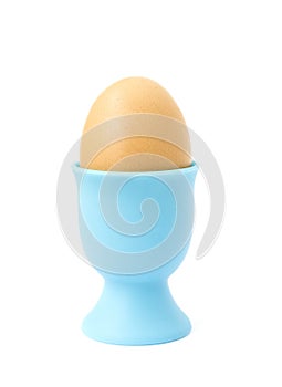 Brown Egg in Blue Silicone Egg Cup.