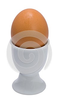 Brown egg on a eggcup