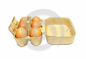 The brown eggs in egg box