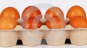Brown eggs in egg box