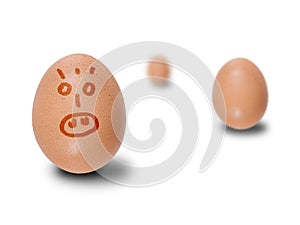 Brown eggs with faces drawn