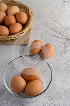 Brown eggs and glasses bowl