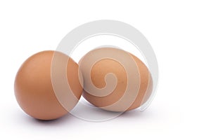 Brown eggs, on white.
