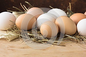 Brown eggs on wooden table. Chicken Egg. Hen eggs basket