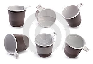 Brown empty plastic cup isolated on white background