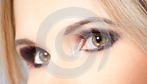 Brown eyes of young woman