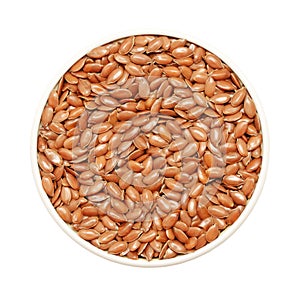 Brown flax seeds isolated on white background