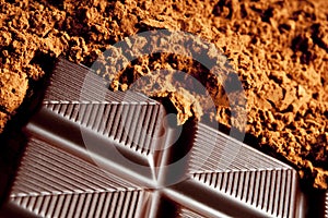 Brown food background with cocoa powder and chocolate