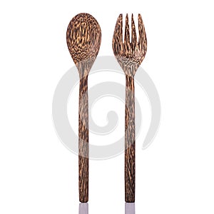 Brown fork made from palm wood. Studio shot isolated on white ba