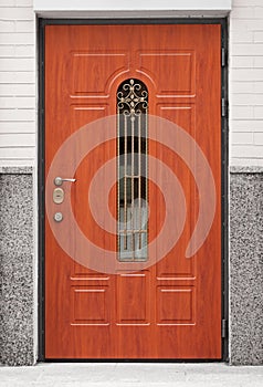 Brown front door - entrance to the building