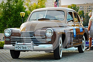 Brown GAZ Pobeda (vintage USSR car)