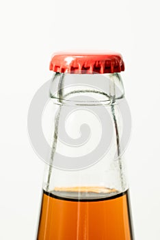 Brown glass bottle and red cap. Beer bottle