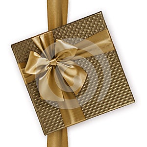 Brown golden color gift box with ribbon and bow isolated on white background, top view