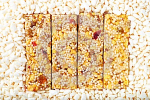 Brown granola bars isolated on puffed air rice background