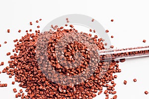 Brown granules of polypropylene, polyamide. Background. Plastic and polymer industry. Microplastic products.