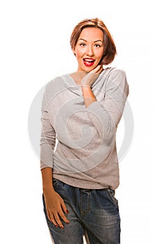 Brown hair beautiful woman very excited wearing grey shirt and j