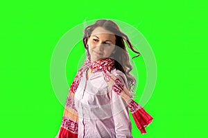 brown haired woman wiith scarf in green screen