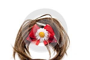 Brown hairpiece with red loop photo