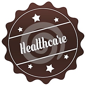 Brown HEALTHCARE stamp on white background.