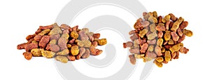 Brown kibble pieces for cat feed heap set isolated on white background. Healthy dry pet food.