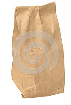 Brown kraft paper bag for packaging products in stores on an isolated background
