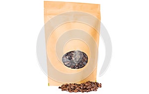 Brown kraft paper doypack stand up pouch with oval window zipper filled with coffee beans on white background