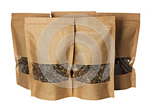 Brown kraft paper pouch bags front view isolated on a white background. Packaging for foods and goods template mock-up photo