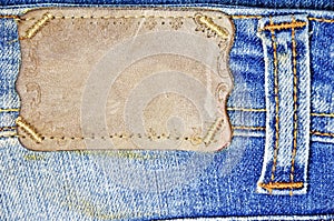 Brown label on blue jeans