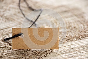 Brown label tag on wood