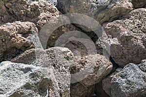 Brown large porous stones background. Natural landscape decorative material