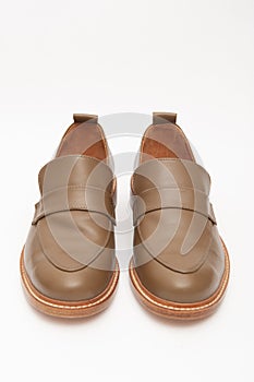 brown leather men's shoes on a white background