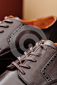 Brown leather men& x27;s shoes in classic style close-up
