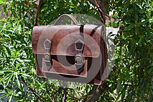 Brown leather messenger bag