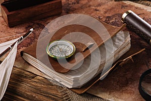 Brown leather notebook with compass