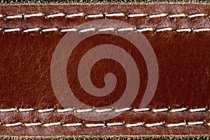 Brown leather with seam background.