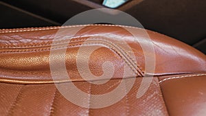 Brown leather seat in a classical American muscle car.