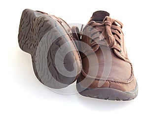 Brown leather shoes isolated over white