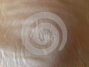 Brown leather surface. Background design, photography. Textile, fabric template, modern new