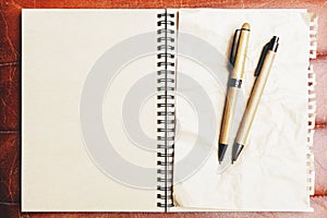 Brown leather table with supplies