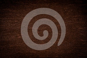 Brown leather texture.Dark brown background.Copy space