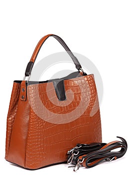 Brown leather woman's handbag isolated on white background