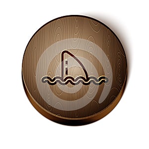 Brown line Shark fin in ocean wave icon isolated on white background. Wooden circle button. Vector