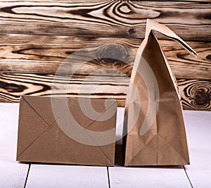 Brown Lunch Bag on white wooden table