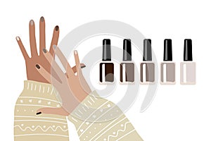 Brown manicure ideas. Female hands with nails of different colors and nail polish bottles. Manicure set. Concept of