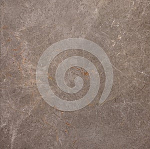 Brown marble wall or flooring pattern surface texture. Close-up of interior material for design decoration background