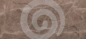 Brown marble wall or flooring pattern surface texture. Close-up of interior material for design decoration background