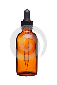 Brown medicine glass bottle with dropper isolated photo