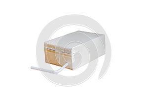 Brown milk carton is crumple isolated on white