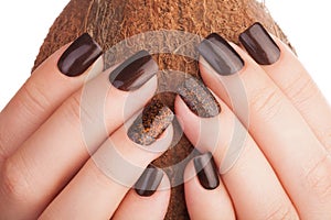 Brown nails .