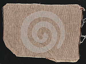 Brown natural simple coarse linen fabric - canvas. Brown burlap fabric background texture.